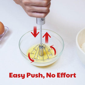 Cooks Innovations semi-automatic whisk demonstrates rotation mechanism for effortless mixing.