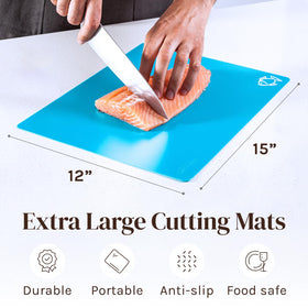 Cooler Kitchen color-coded mats with food icons aid safe ingredient separation.