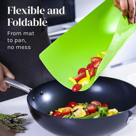 Cooler Kitchen waffle-back mats prevent slipping on countertops during chopping.