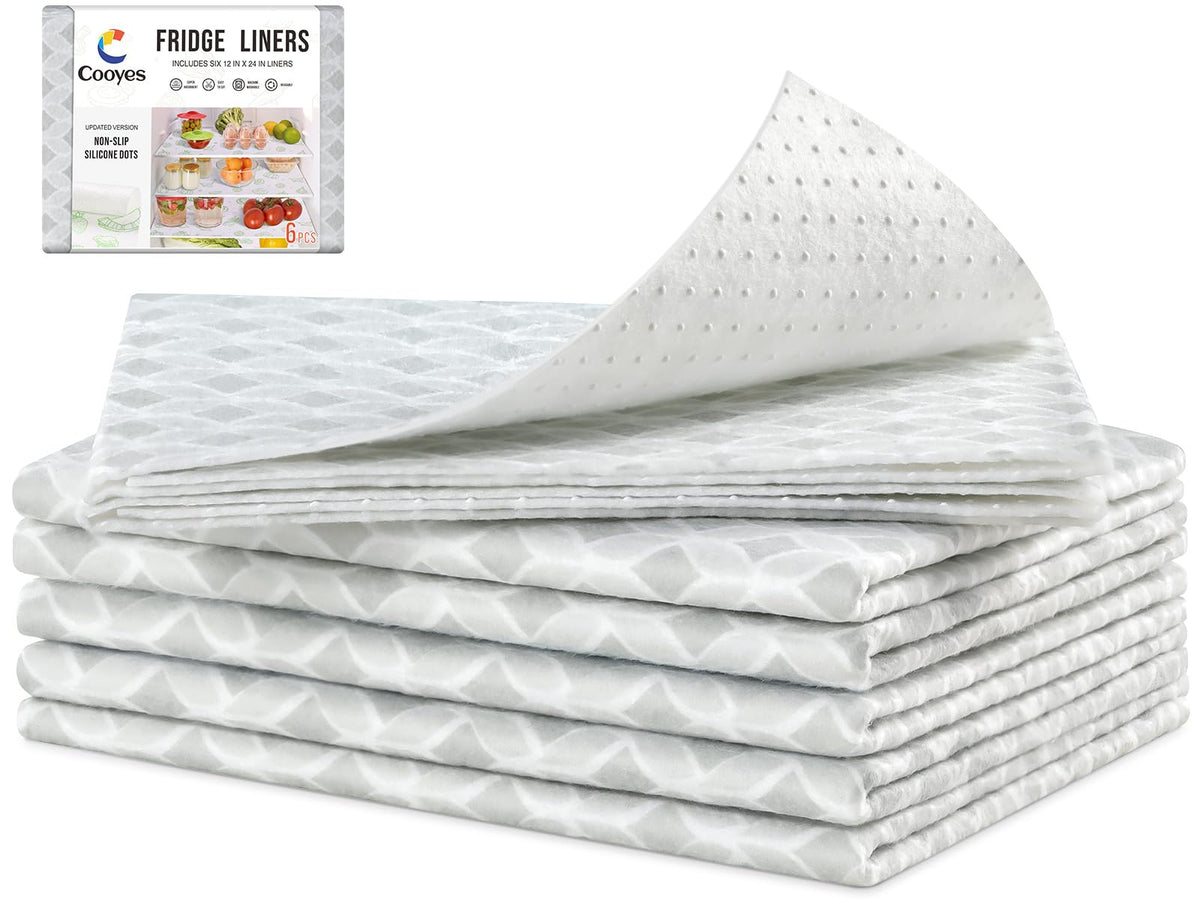Cooyes refrigerator liners absorb spills to keep shelves dry and fresh.