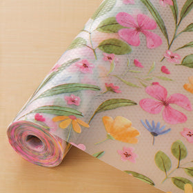 Cooyes shelf liner with a daisy pattern protects surfaces while adding style.