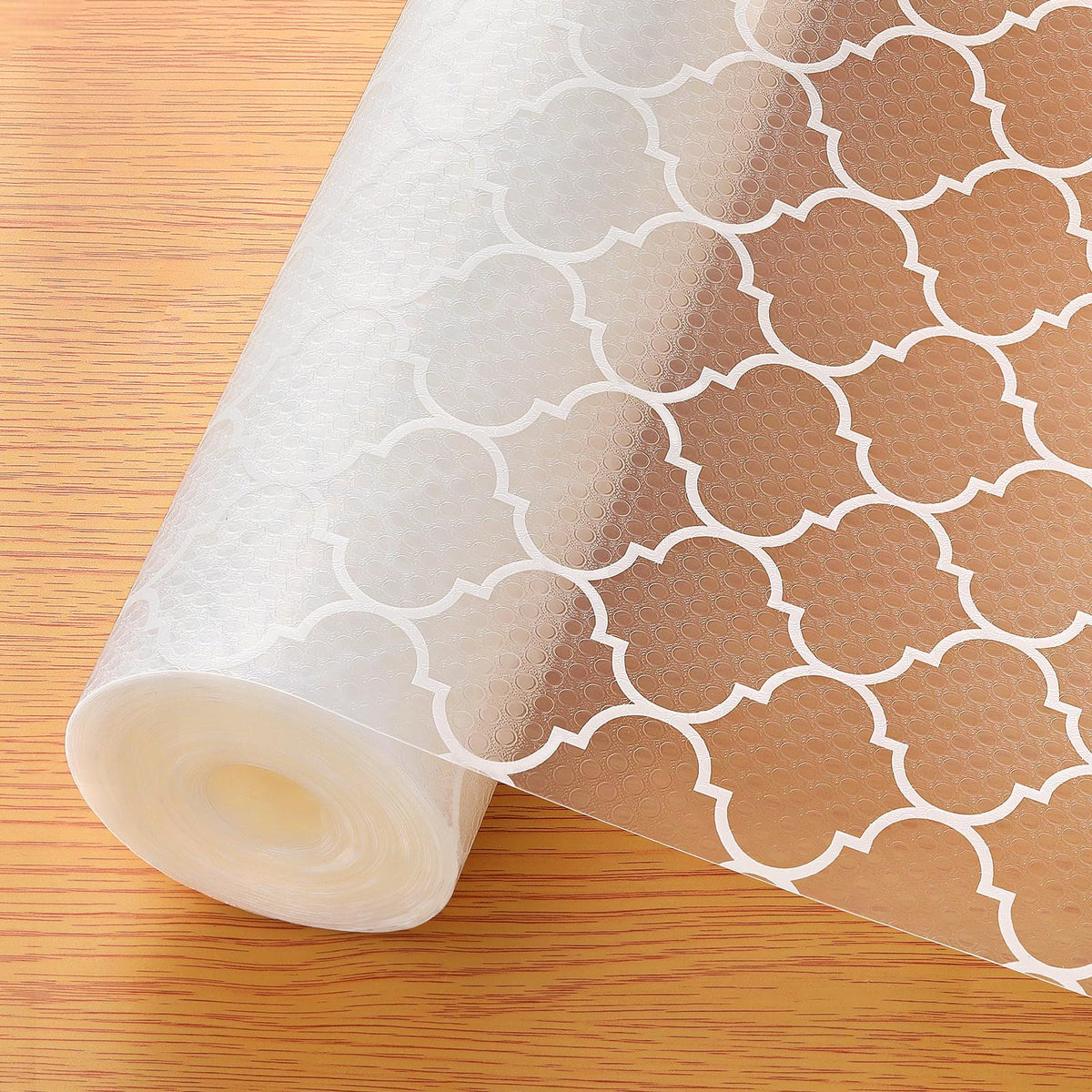 Cooyes shelf liner with modern pattern on a kitchen cabinet for style and protection.