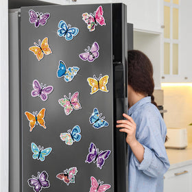 Bright Copkim magnets illuminate metal surfaces with playful butterfly designs