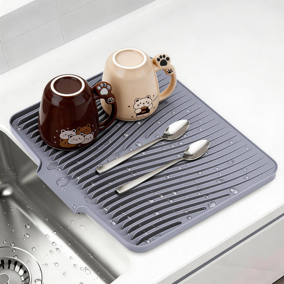 COPLIB silicone dish drying mat with built-in drain keeps counters dry after washing