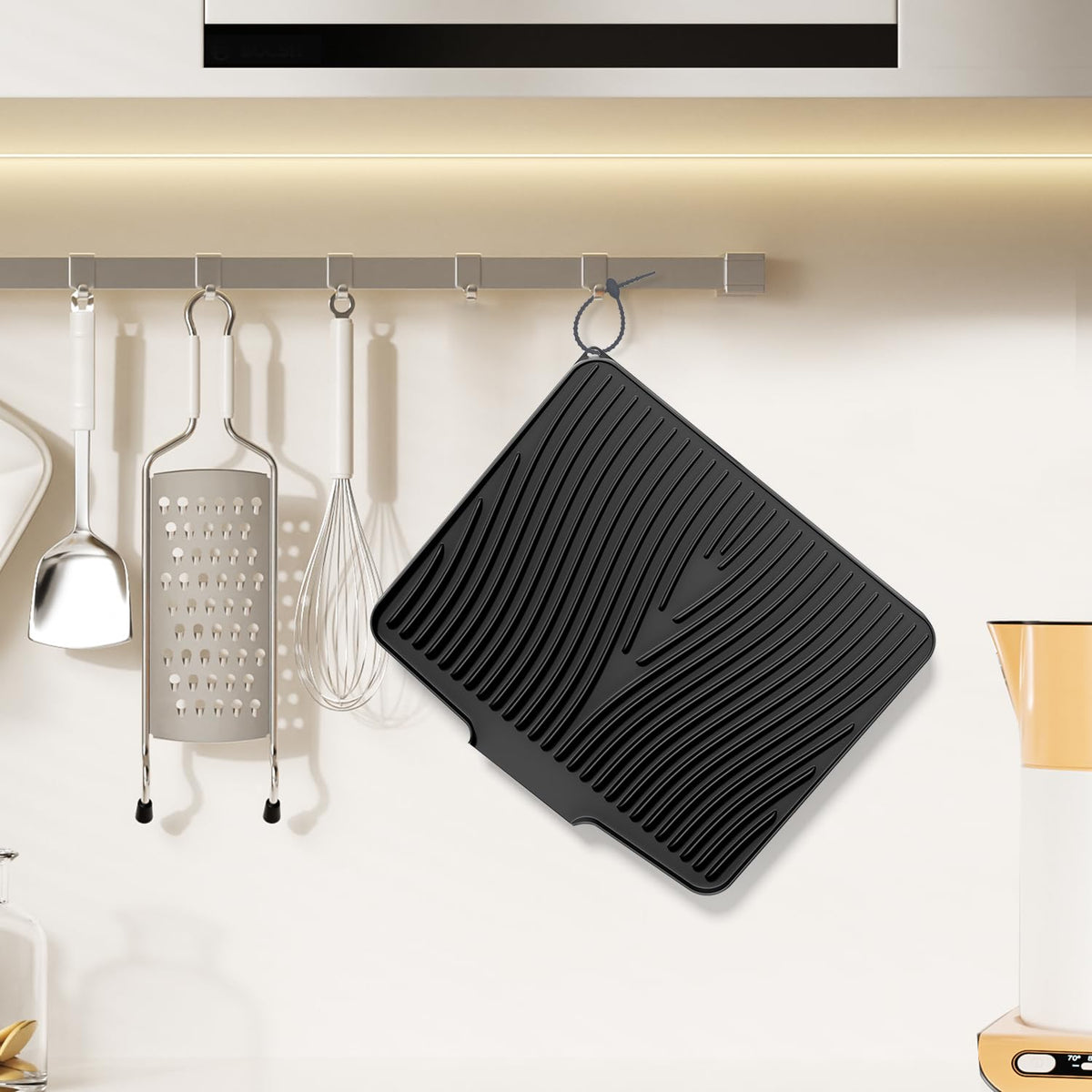 COPLIB mat serving as rack liner and protective pad in kitchen setup.
