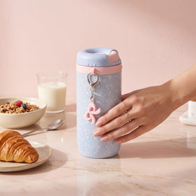 Coquella cupholder-friendly design fits standard car or bag slots