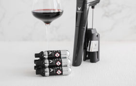 CORAVIN Pure Argon Capsules usage demonstrates gas cartridges enabling smooth pours.
