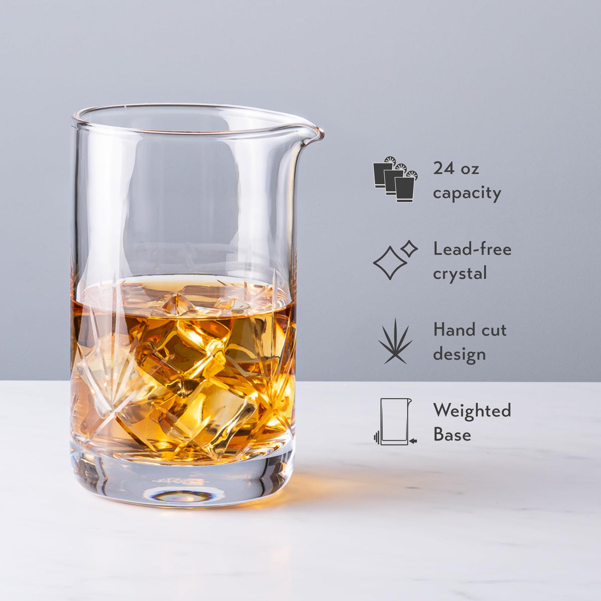 Cork and Mill 2 oz jigger with clear half-ounce markings for accuracy.