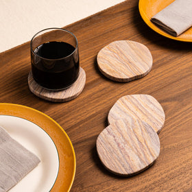 Cork & Mill natural sandstone coaster with soft backing protects surfaces