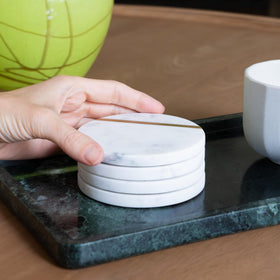 Cork & Mill round coaster, 4-inch diameter for versatile glass sizes.