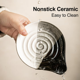 Cormomu ceramic spoon rest with swirl design adds style while protecting surfaces