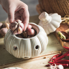 Cormomu countertop garlic keeper keeps ingredients accessible on the counter.