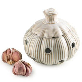 Cormomu Garlic Storage Pod ceramic base on counter keeps garlic fresh and stylish.