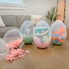 Cornucopia Brands giant clear egg-shaped buckets with handles for easy handling and reuse.