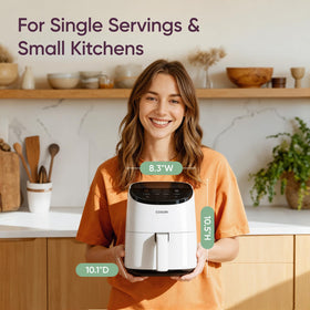 Cosori Lite mini air fryer basket interior emphasizing nonstick surface for easy cleaning.