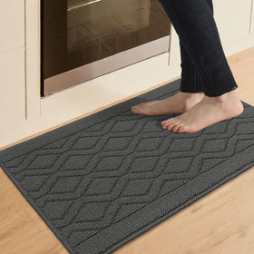 COSY HOMEER kitchen mat with absorbent polypropylene texture keeps floors clean after spills.