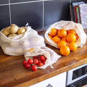 Cottify four XL bags arranged for farmers market and home storage
