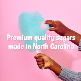 Orange floss sugar jar by Cotton Candy Express adds sunny sweetness to events.