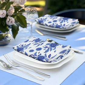 Cotton Craft two-tone white-on-blue napkins ideal for formal dinners.
