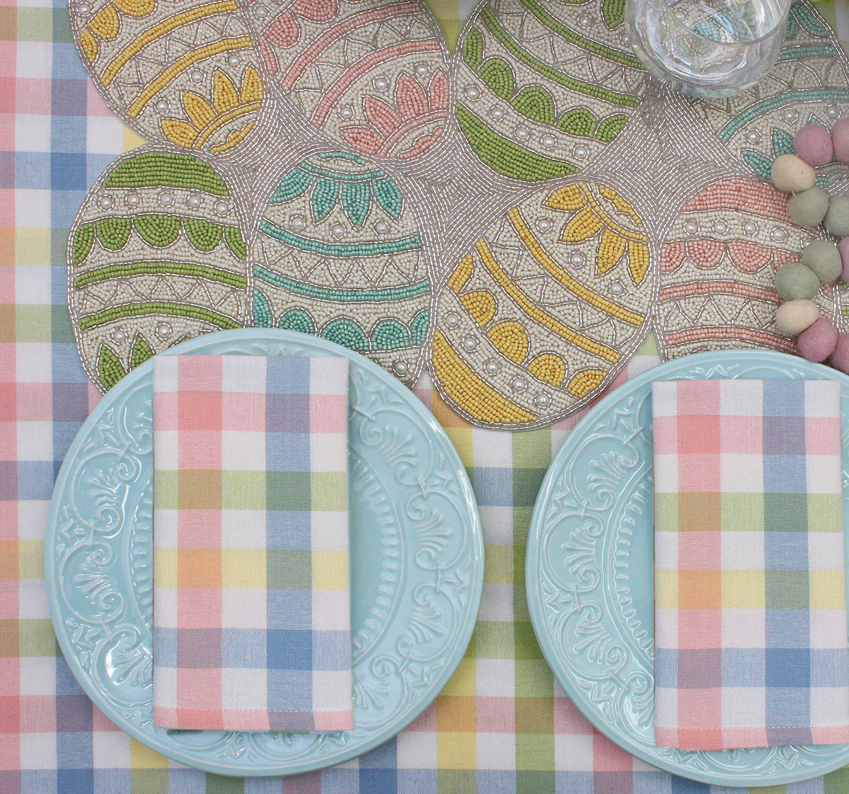 COTTON CRAFT Happy Hunting decor on a sofa table adds color and texture.