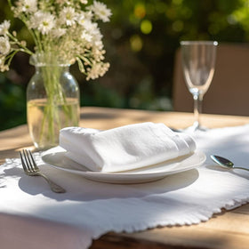 COTTON CRAFT napkins on dining table illustrating versatile use for holidays and everyday meals.