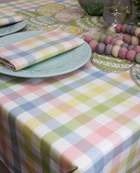 Gingham buffalo check close-up on Cotton Craft tablecloth brightens any dining setting.
