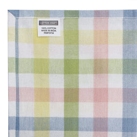 Hem detail on Cotton Craft tablecloth showcases refined finish for upscale tables.