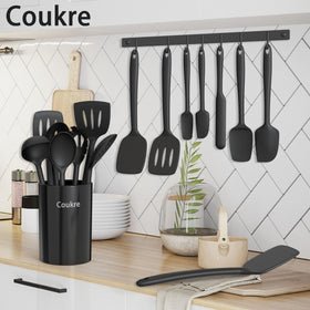 Coukre holder keeps utensils organized and within reach on the counter.