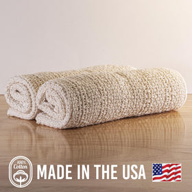 Country Cottons Old Fashion towels in assorted colors brighten kitchen decor.