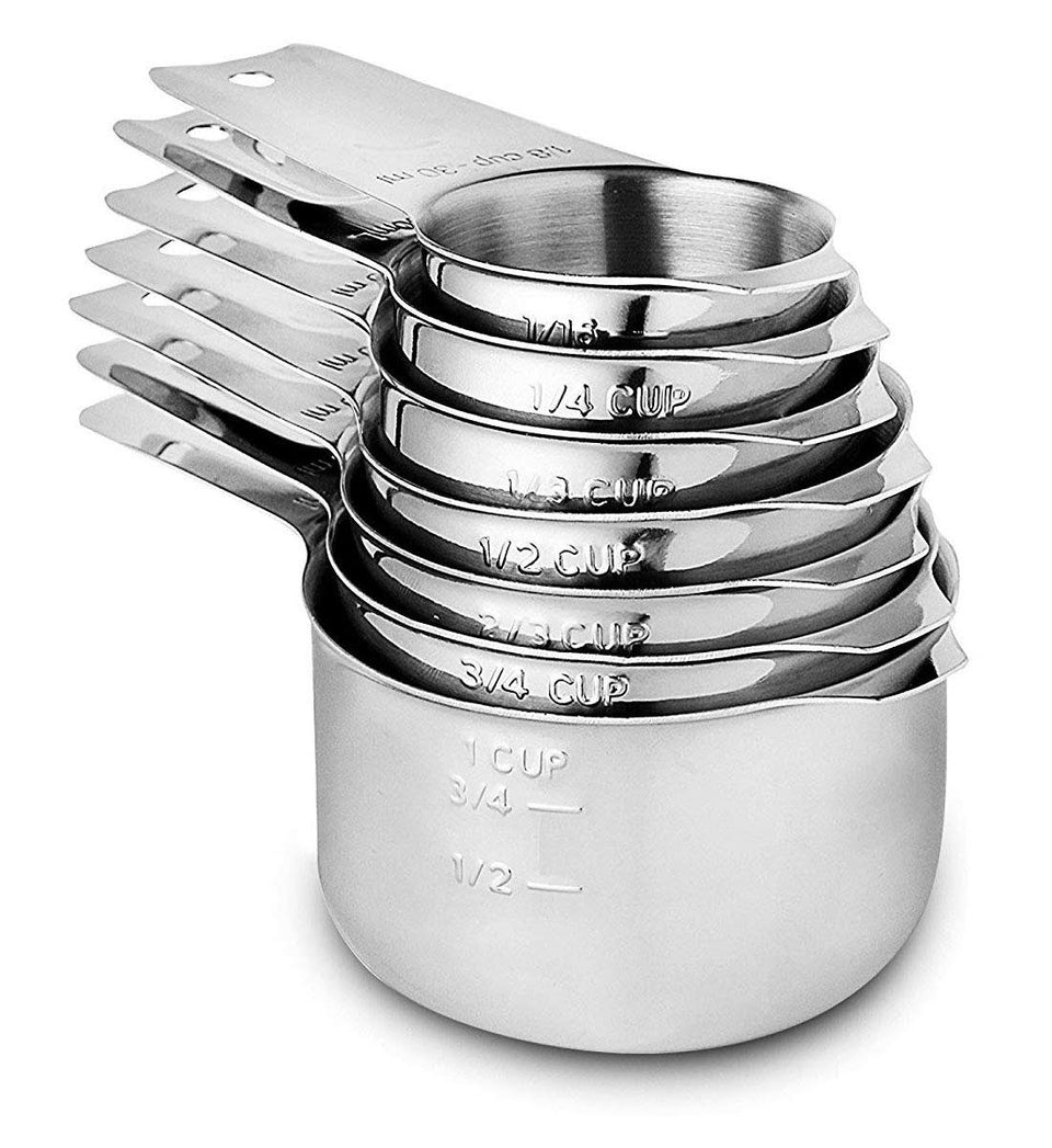 CozyKit 7-piece nestable measuring cups in stainless steel for space-saving kitchen organization.