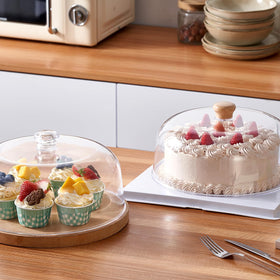 CozyState dome protecting desserts from dust while on display