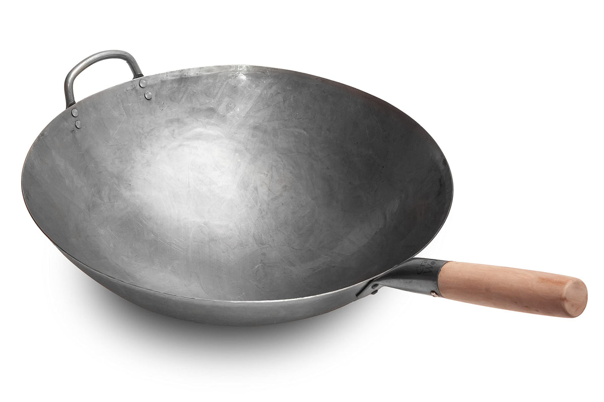 Craft Wok 16-inch hammered top view shows even heat for fast searing.
