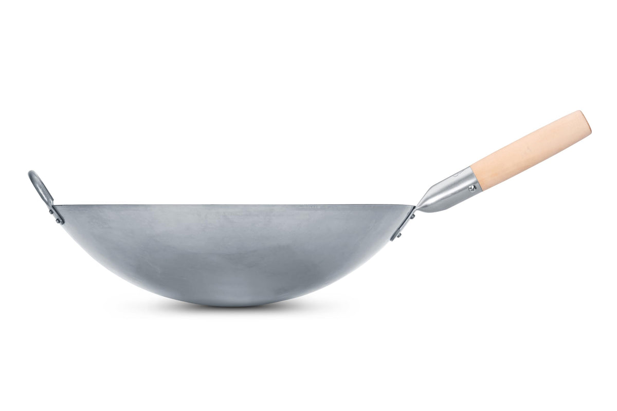 Craft Wok round bottom design emphasizes traditional wok versatility for authentic cooking.