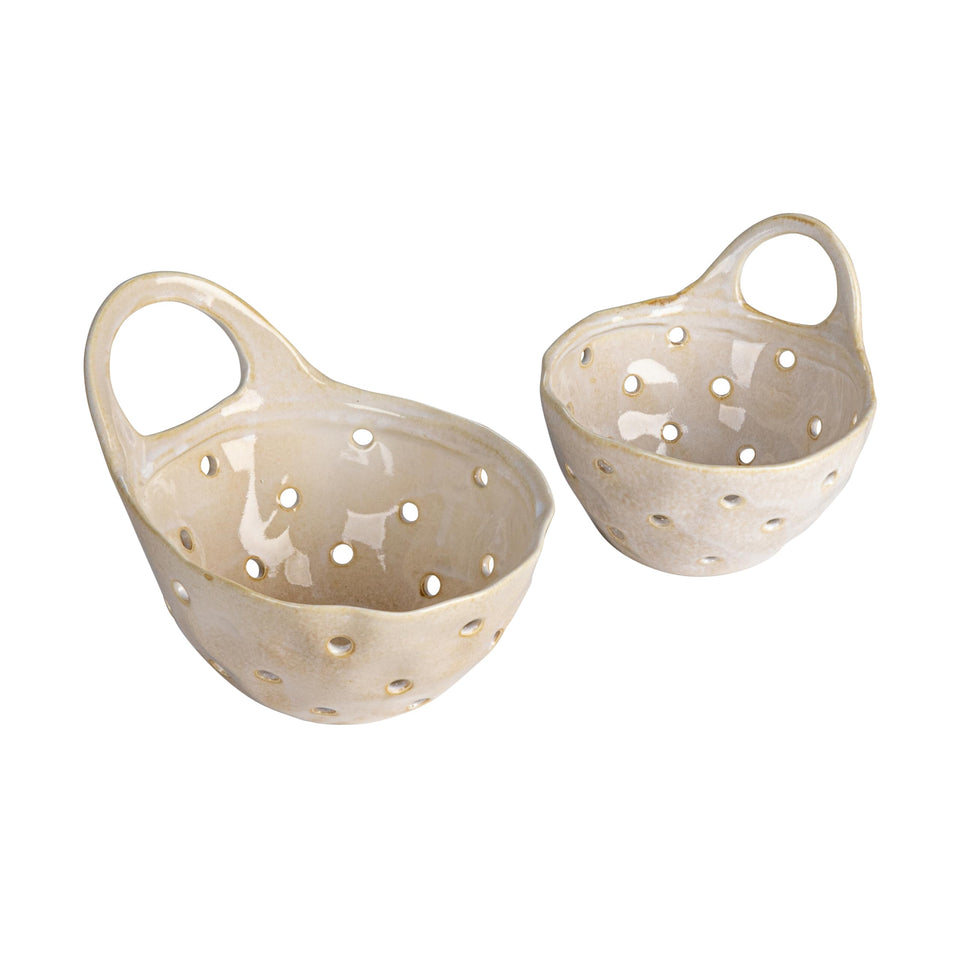 Creative Co-Op Cream Stoneware Colanders on a counter for easy rinsing and air-drying small fruits