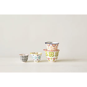 Creative Co-Op 1/2 cup floral stoneware stamp adds decorative utility for precise baking.