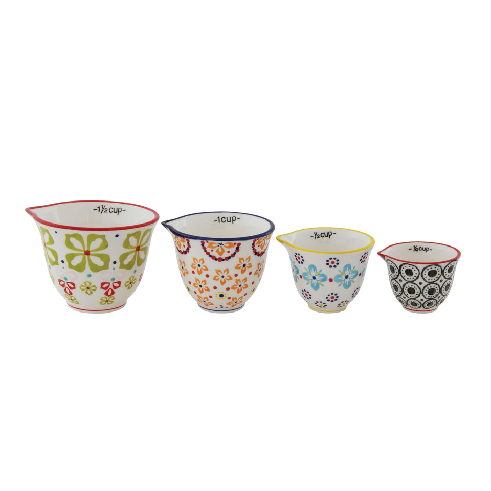 Creative Co-Op floral hand stamped stoneware measuring cup in 1.5 cup size for precise prep.
