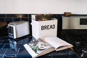 Creative Co-Op hand wash only bread box for durable care.