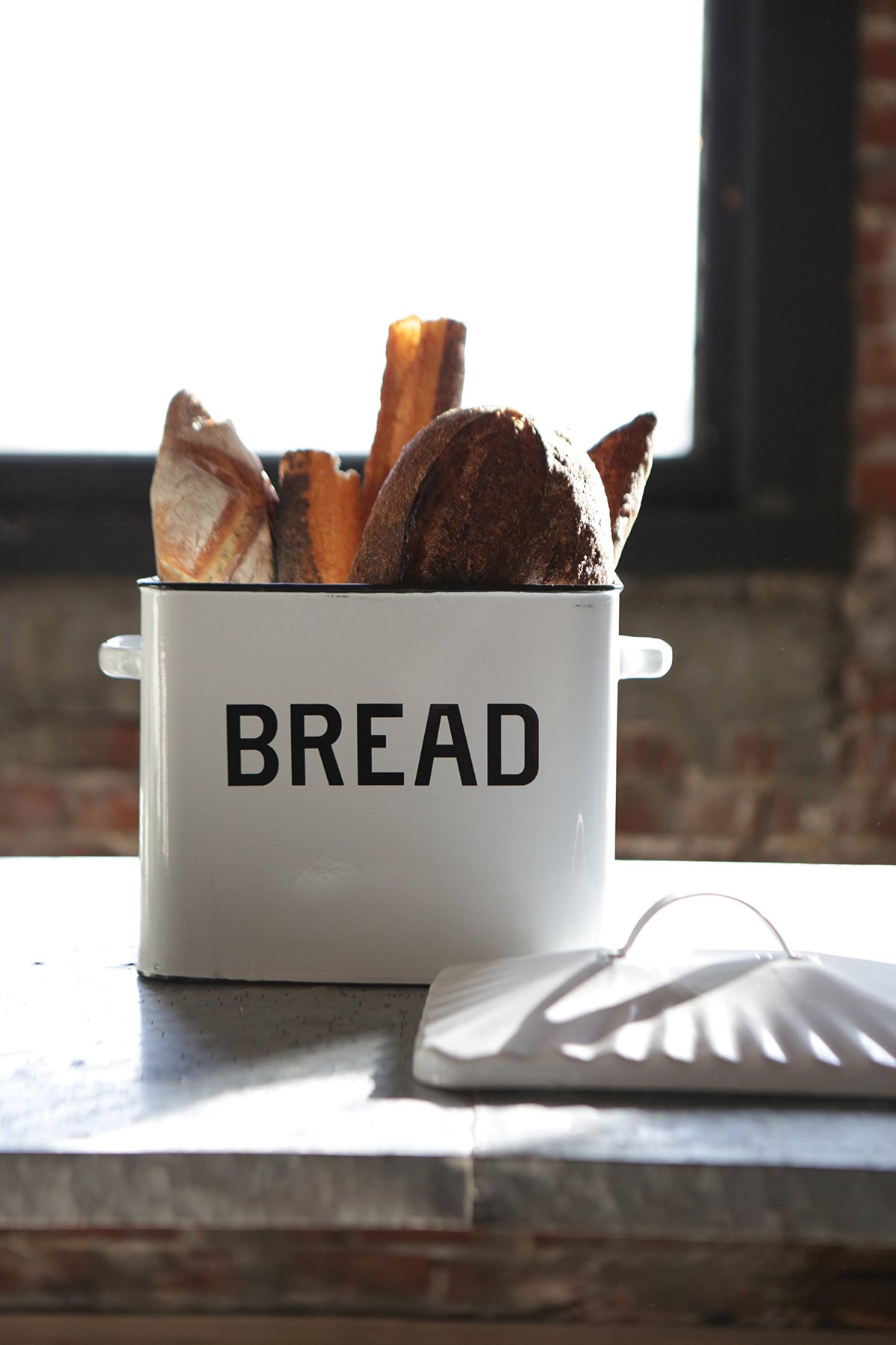 Creative Co-Op steel and enamel construction for sturdy storage.
