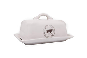 Creative Co-Op stoneware butter dish with cow decal keeps butter ready on the counter