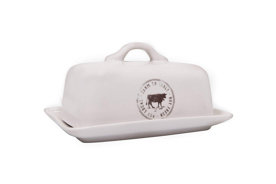 Creative Co-Op stoneware butter dish with cow decal keeps butter ready on the counter