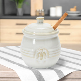Creative Co-Op wooden honey dipper complements the honey pot for effortless serving.