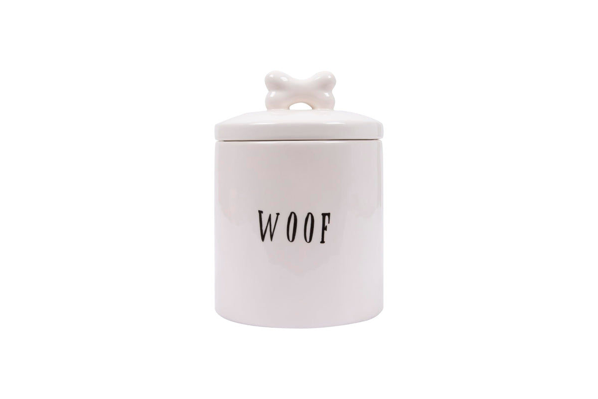 Creative Co-Op Woof Jar with bone-handle lid for stylish dog treat display.