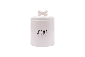 Creative Co-Op Woof Jar with bone-handle lid for stylish dog treat display.