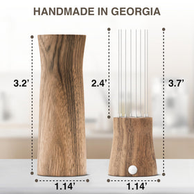 Creatomer WDT walnut holder provides convenient storage beside espresso machine.