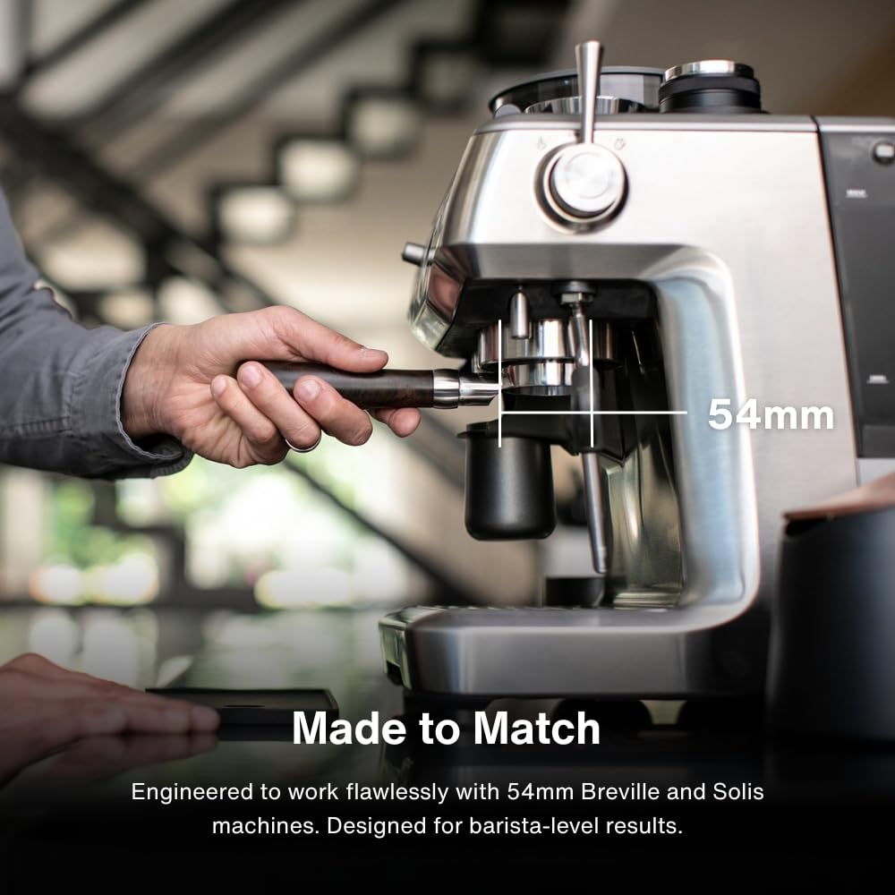 CREMA bottomless naked portafilter demonstrates live shot flow for technique tuning.