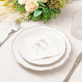 Crisky napkins on cake table as a silver foil accent for decor.