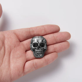 Cucaledo skull magnets compact size fits tight spaces on fridges.