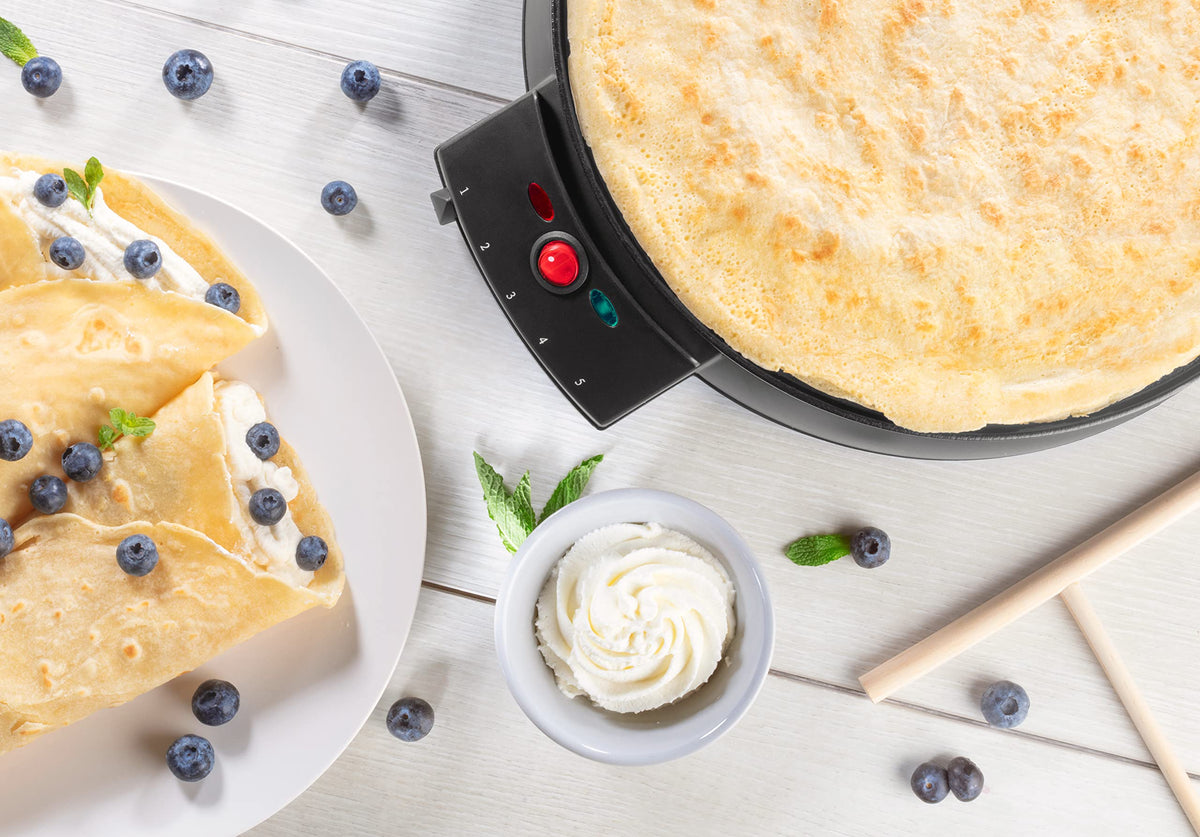 Holiday brunch setup featuring the CucinaPro crepe maker on a prep station