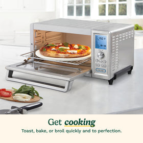 Cuisinart Chef's Convection Toaster Oven blue backlit display highlighting precise temperature control.