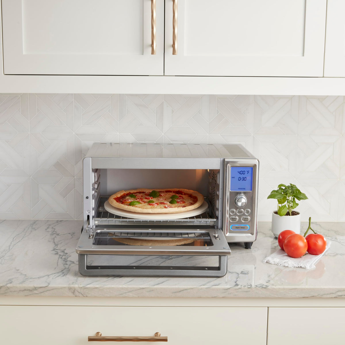 Cuisinart Chef's Convection Toaster Oven with pizza inside showing even browning potential.